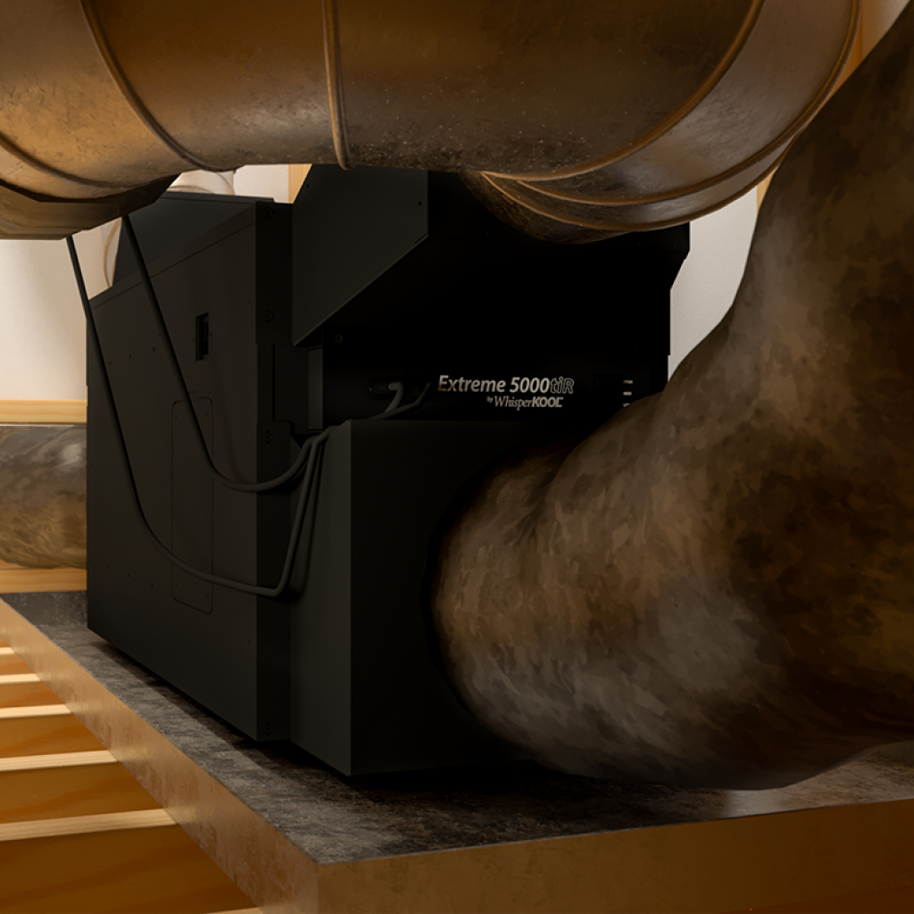 A WhisperKOOL Fully Ducted Extreme 8000tiR unit is tightly wedged between two metal air ducts in a confined space, showcasing the advanced fully ducted design of WhisperKOOL systems.