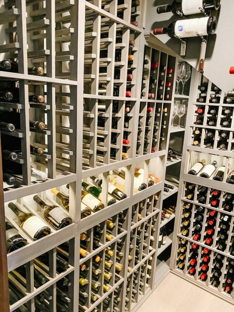 Wine cellar, bottles, racks.