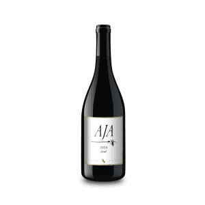 A 2014 bottle of AJA Vineyards Malibu Coast Syrah displayed on a black background.