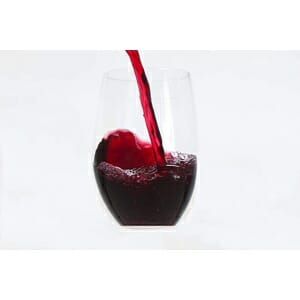 A glass of Elegant & Practical Tritan Wine Glasses | Reusable being poured into a glass.
