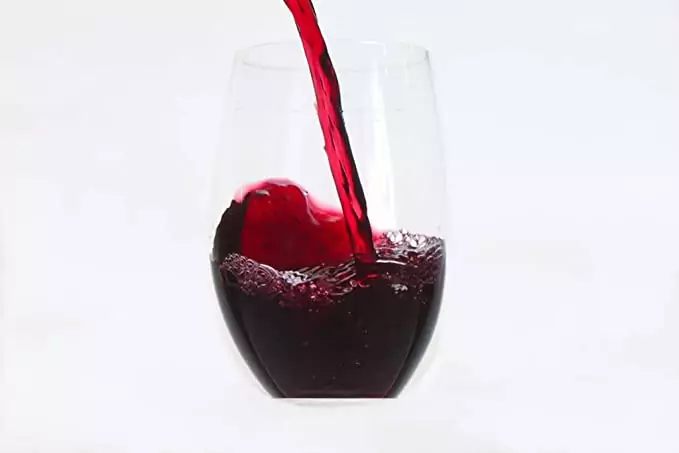 A glass of Elegant & Practical Tritan Wine Glasses | Reusable being poured into a glass.