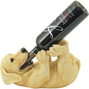 A Lab holding a Wine Holder.