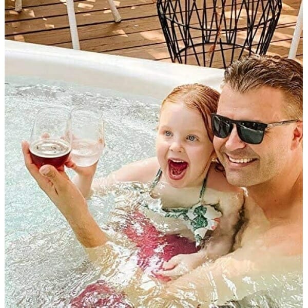 A man and a little girl using Elegant & Practical Tritan Wine Glasses | Reusable, Dishwasher-Safe | BPA-Free | 100% Tritan | 4-Pack during their hot tub