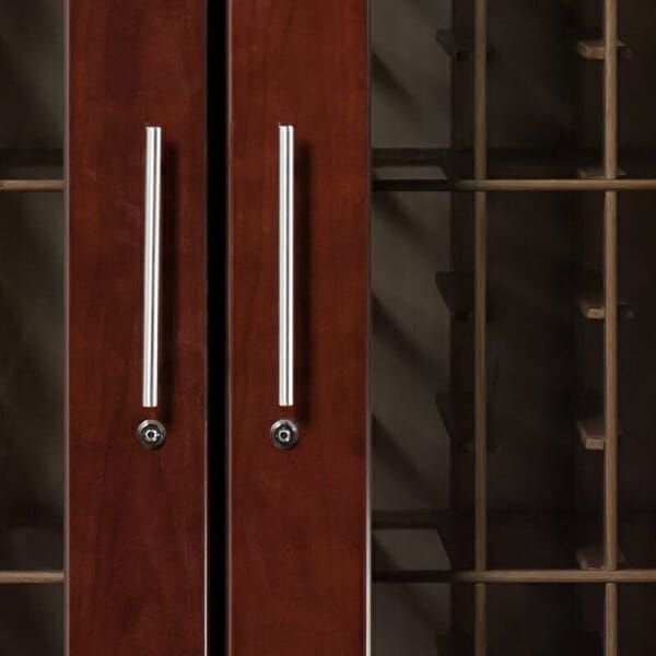 Le Cache Vault 3100 Wine Cabinet Classic Cherry with wooden door and metal handles.