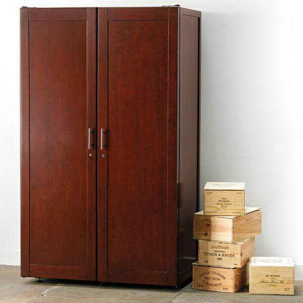 Le Cache Vault 3100 Wine Cabinet Classic Cherry, white wall.
