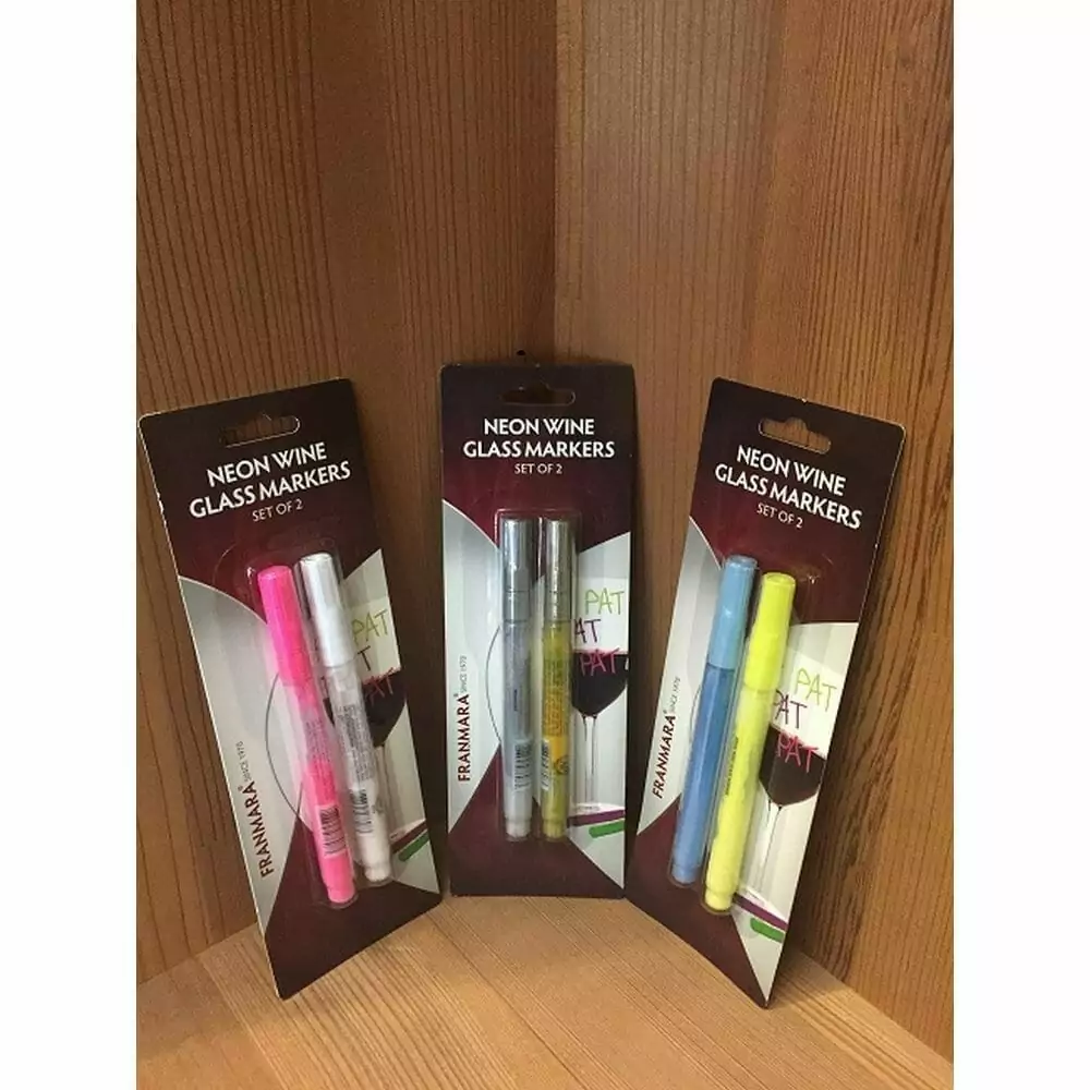 A trio of vibrant wine markers adorning the table.