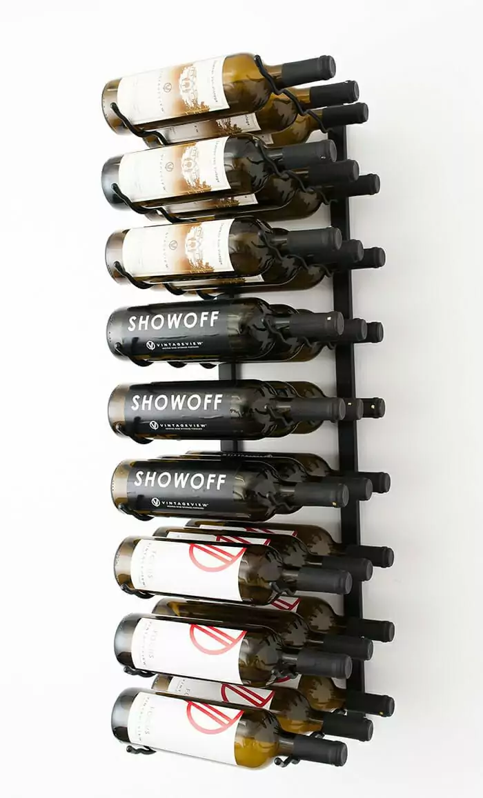 A Wall Mounted Metal Wine Rack that can hold 27 bottles of wine.