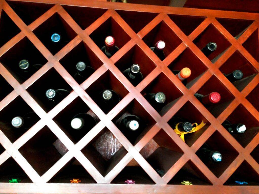 A custom wine rack designed for wine collectors, providing an optimal storage solution for a large quantity of bottles.