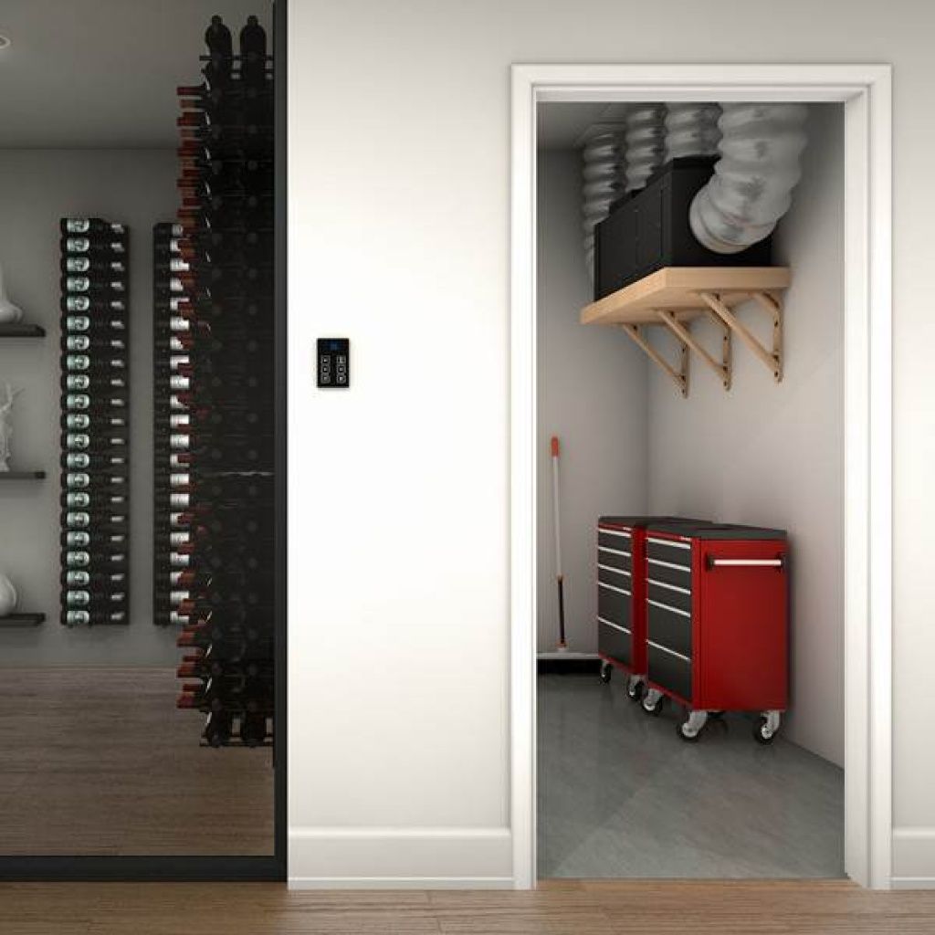 A room with red tool cabinets on wheels is adjacent to a space with a wine rack filled with bottles. The room also features ventilation ducts on a shelf above the cabinets.